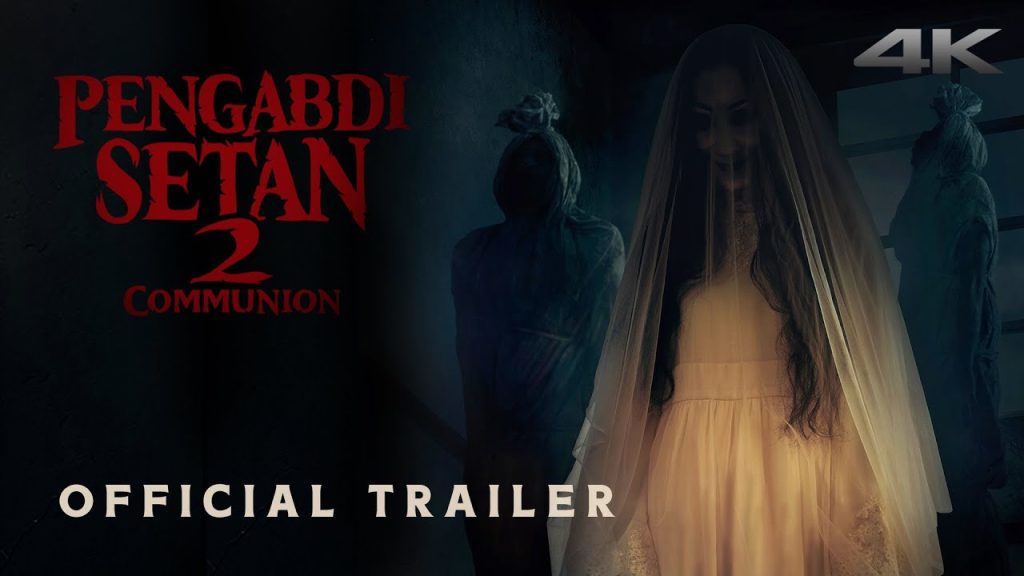 Poster film horor Indonesia Satan’s Slaves: Communion (2022), sekuel Pengabdi Setan dengan latar apartemen tua yang menyeramkan.
